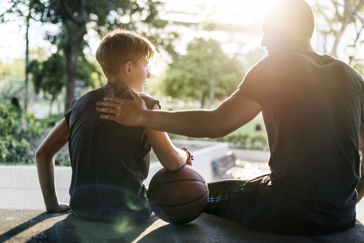 Young basketball player shoot
